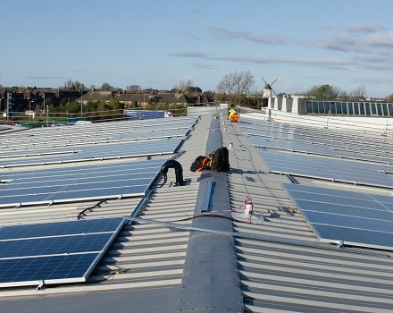 Solar panels being installed on Glasdon Warehouse