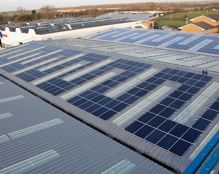 Solar panels being installed on Glasdon Warehouse